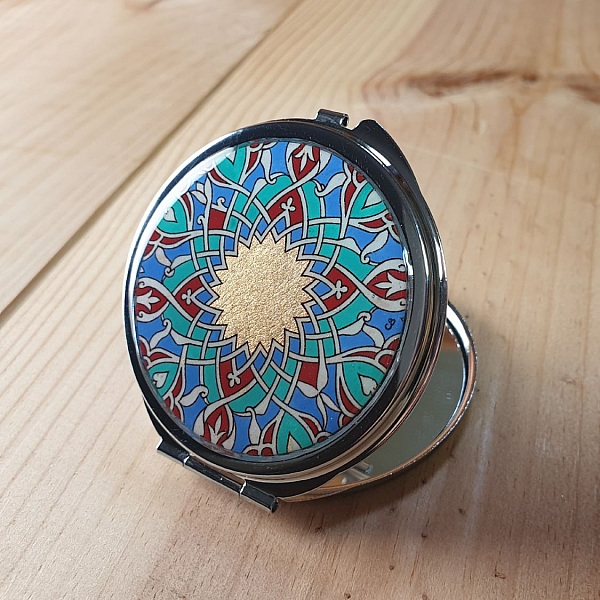 Arabesque belyst taskespejl