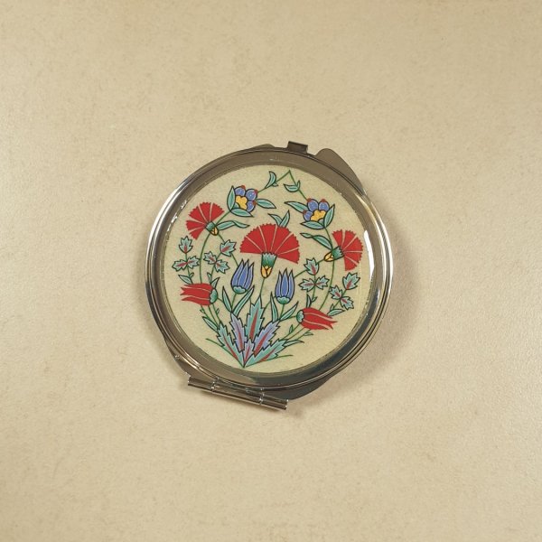 Miroir de sac enluminure fleurs orientales sur parchemin